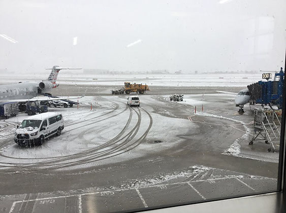 Snow storm caused our fight to be delayed.